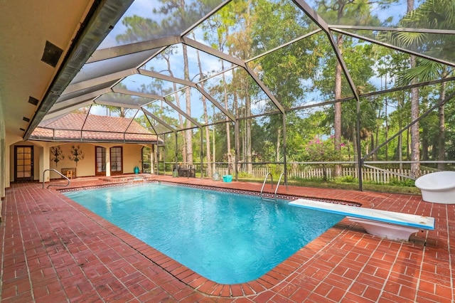 11357 Roselynn Way, Lake Worth, FL 33449 - view of swimming pool featuring a patio, glass enclosure, and a diving board