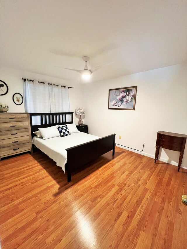 12484 Pleasant Green Way, Boynton Beach, FL 33437 - bedroom with wood finished floors, a ceiling fan, and baseboards