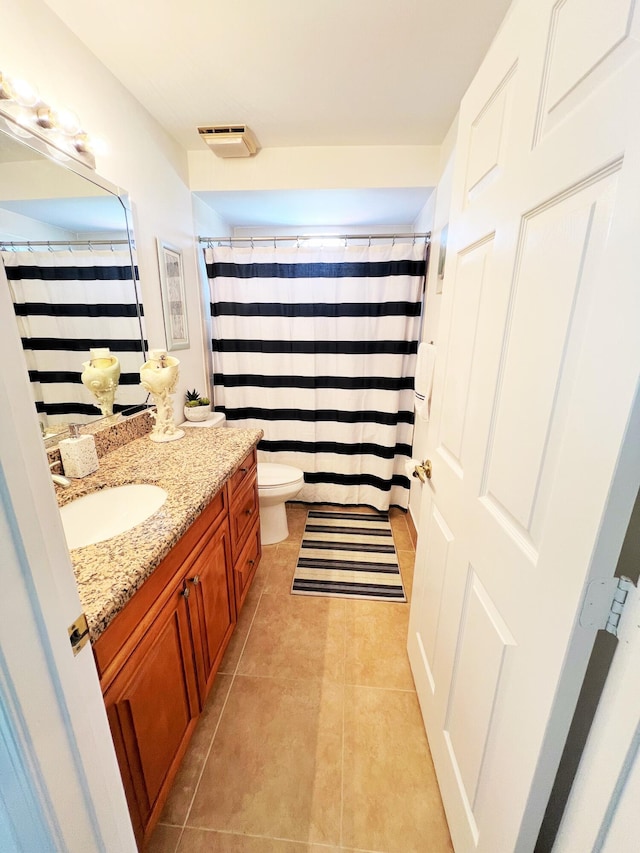 12484 Pleasant Green Way, Boynton Beach, FL 33437 - bathroom with vanity, tile patterned flooring, toilet, and a shower with shower curtain