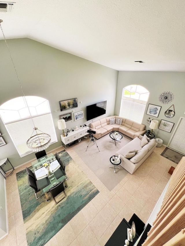 12484 Pleasant Green Way, Boynton Beach, FL 33437 - tiled living room featuring high vaulted ceiling
