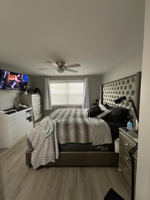 1530 SE Royal Green Cir Unit N103, Port Saint Lucie, FL 34952 - bedroom with wood finished floors and ceiling fan