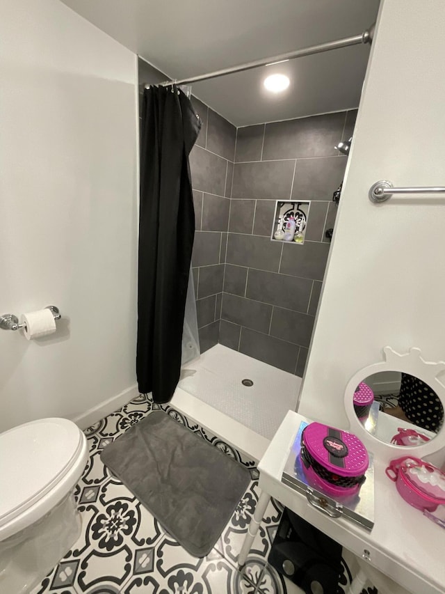1530 SE Royal Green Cir Unit N103, Port Saint Lucie, FL 34952 - full bath featuring a stall shower, toilet, and tile patterned floors