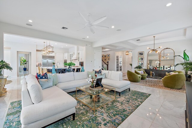 8164 SE Old Plantation Cir, Jupiter, FL 33458 - living room featuring ceiling fan, a chandelier, recessed lighting, and stairway
