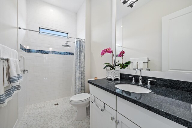 8164 SE Old Plantation Cir, Jupiter, FL 33458 - full bathroom with vanity, tiled shower, and toilet