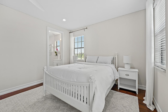 8164 SE Old Plantation Cir, Jupiter, FL 33458 - bedroom with wood finished floors, baseboards, and recessed lighting