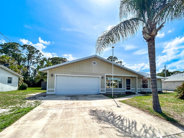 1712 SW Airoso Blvd, Port Saint Lucie, FL 34984 - ranch-style house with a garage, concrete driveway, and a front yard