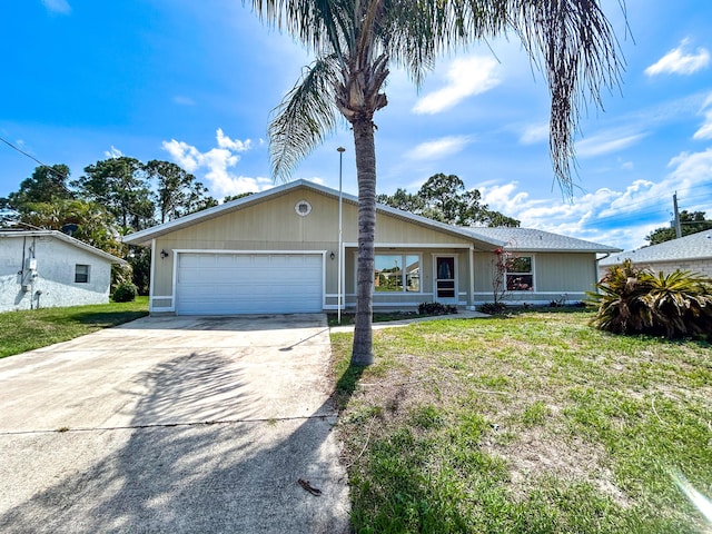 1712 SW Airoso Blvd, Port Saint Lucie, FL 34984 - ranch-style home with an attached garage, driveway, and a front yard