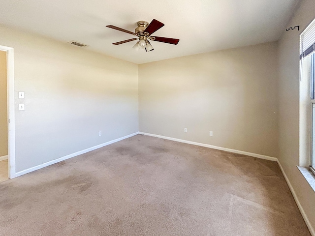 1712 SW Airoso Blvd, Port Saint Lucie, FL 34984 - carpeted spare room with a ceiling fan and baseboards