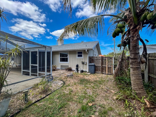 1712 SW Airoso Blvd, Port Saint Lucie, FL 34984 - back of property featuring roof with shingles