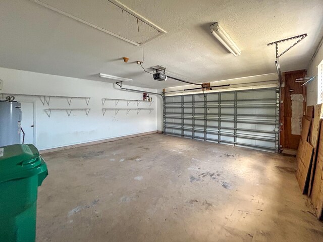 1712 SW Airoso Blvd, Port Saint Lucie, FL 34984 - garage with water heater and a garage door opener