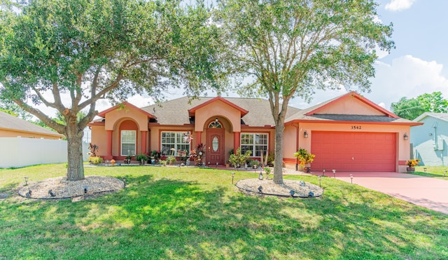 3542 SW Rosardo St, Port Saint Lucie, FL 34953 - view of front of house with stucco siding, an attached garage, and concrete driveway
