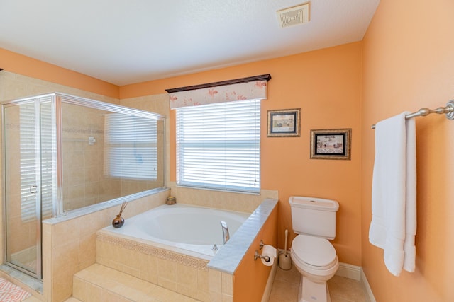 3542 SW Rosardo St, Port Saint Lucie, FL 34953 - bathroom with a garden tub, toilet, a shower stall, and tile patterned floors