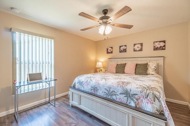 3542 SW Rosardo St, Port Saint Lucie, FL 34953 - bedroom featuring wood finished floors, baseboards, and a ceiling fan