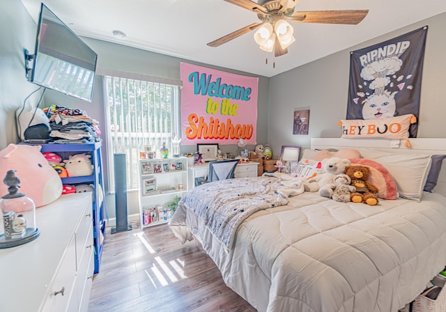 3542 SW Rosardo St, Port Saint Lucie, FL 34953 - bedroom featuring wood finished floors and ceiling fan
