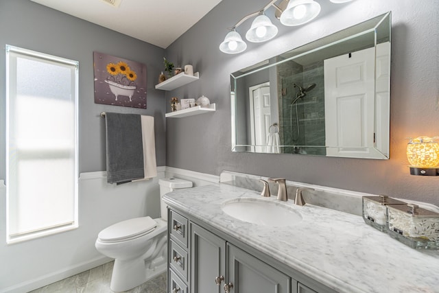 3542 SW Rosardo St, Port Saint Lucie, FL 34953 - full bath featuring vanity, a tile shower, toilet, and baseboards