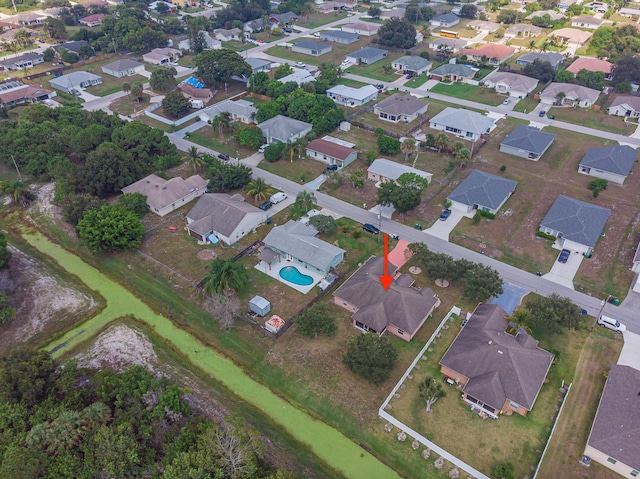 3542 SW Rosardo St, Port Saint Lucie, FL 34953 - aerial view of property and surrounding area featuring nearby suburban area