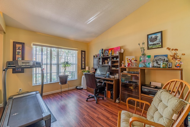 3542 SW Rosardo St, Port Saint Lucie, FL 34953 - office area featuring wood finished floors, vaulted ceiling, a textured ceiling, and baseboards