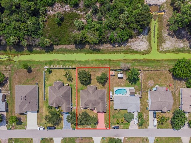 3542 SW Rosardo St, Port Saint Lucie, FL 34953 - aerial perspective of suburban area featuring property parcel outlined