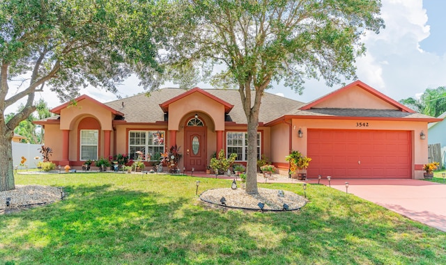 3542 SW Rosardo St, Port Saint Lucie, FL 34953 - single story home featuring stucco siding, a garage, concrete driveway, and a shingled roof