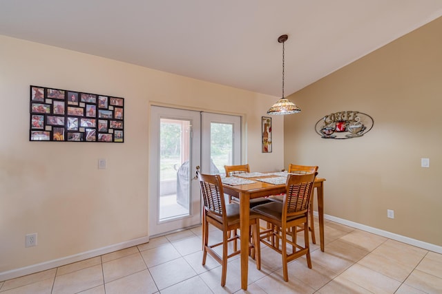 3542 SW Rosardo St, Port Saint Lucie, FL 34953 - dining space featuring baseboards, french doors, and light tile patterned floors