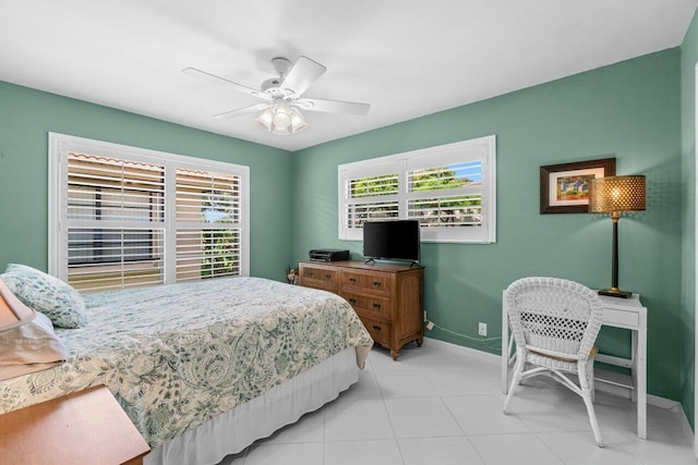 4680 Rosewood Tree Ct Unit A, Boynton Beach, FL 33436 - bedroom with baseboards, ceiling fan, and light tile patterned flooring
