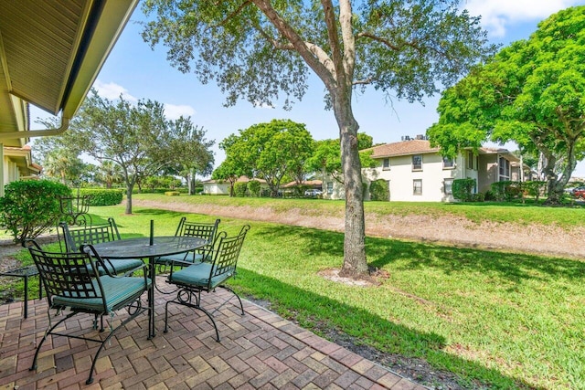 4680 Rosewood Tree Ct Unit A, Boynton Beach, FL 33436 - view of patio with outdoor dining area
