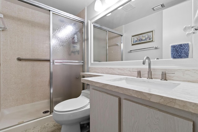 437 Pine Glen Ln Unit B-2, Greenacres, FL 33463 - bathroom featuring vanity, a stall shower, and toilet