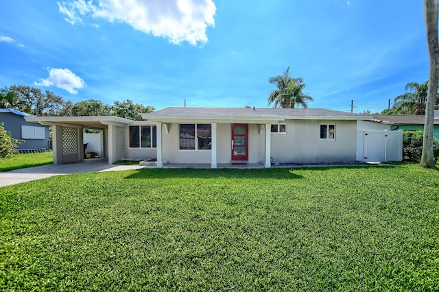 126 NW 3rd Ct, Boca Raton, FL 33432 - single story home with concrete driveway, a carport, and stucco siding