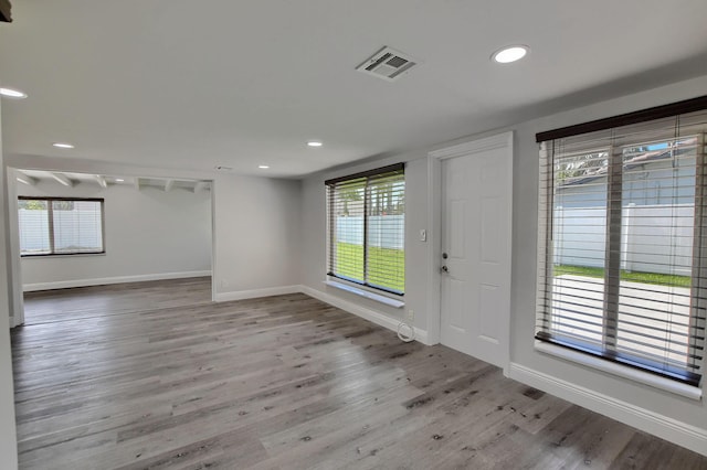 126 NW 3rd Ct, Boca Raton, FL 33432 - foyer entrance featuring wood finished floors, baseboards, and recessed lighting