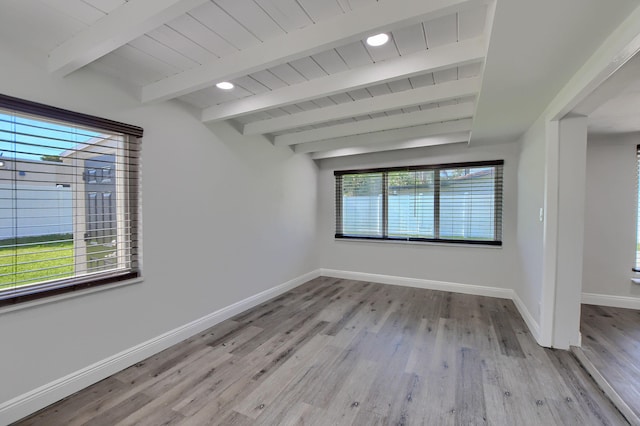 126 NW 3rd Ct, Boca Raton, FL 33432 - unfurnished room with baseboards, wood finished floors, and wood ceiling with exposed beams