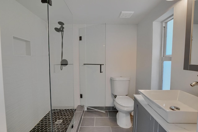 126 NW 3rd Ct, Boca Raton, FL 33432 - bathroom with toilet, a shower stall, vanity, and tile patterned floors