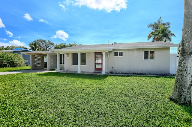 126 NW 3rd Ct, Boca Raton, FL 33432 - ranch-style home with stucco siding, a carport, and a front yard