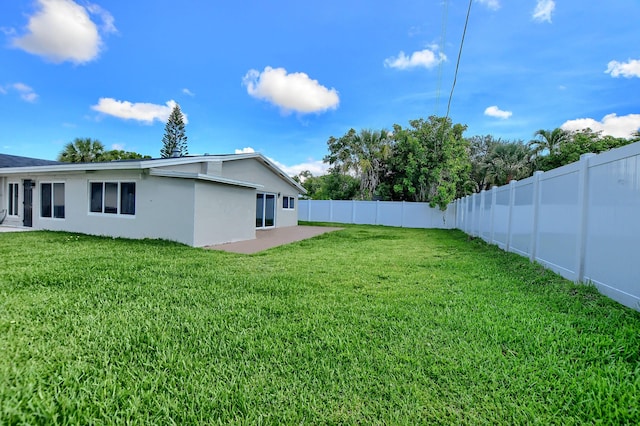 126 NW 3rd Ct, Boca Raton, FL 33432 - view of yard featuring a patio