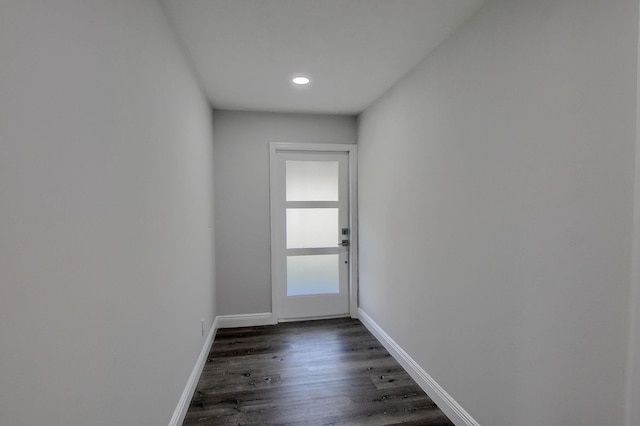 126 NW 3rd Ct, Boca Raton, FL 33432 - doorway featuring baseboards, dark wood-type flooring, and recessed lighting