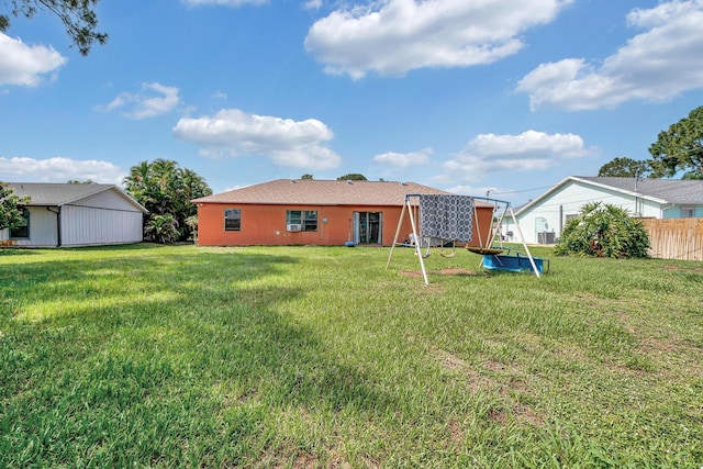 1352 SW Halford Ave, Port Saint Lucie, FL 34953 - rear view of property featuring stucco siding