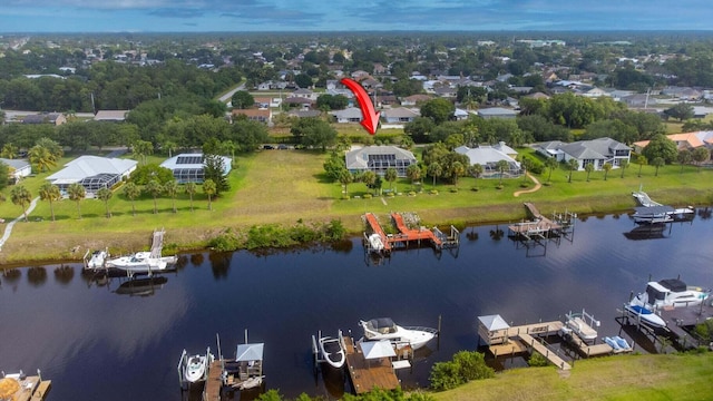 2608 SW River Shore Dr, Port Saint Lucie, FL 34984 - aerial perspective of suburban area featuring a large body of water