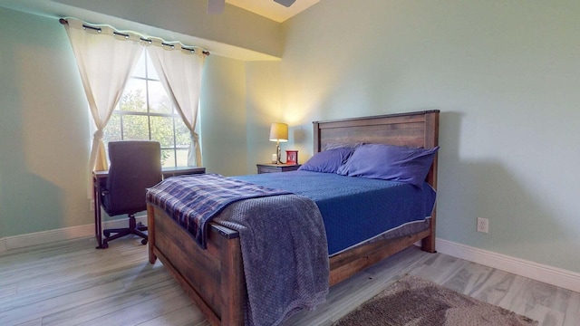 2608 SW River Shore Dr, Port Saint Lucie, FL 34984 - bedroom with baseboards and light wood-style flooring