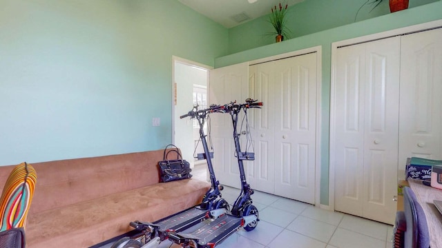 2608 SW River Shore Dr, Port Saint Lucie, FL 34984 - exercise area featuring light tile patterned floors