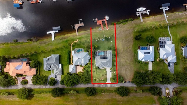 2608 SW River Shore Dr, Port Saint Lucie, FL 34984 - aerial perspective of suburban area with property parcel outlined