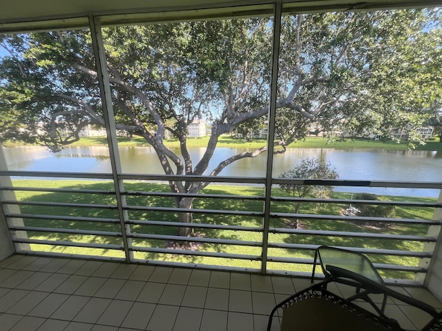 161 Dorset D, Boca Raton, FL 33434 - unfurnished sunroom with a water view
