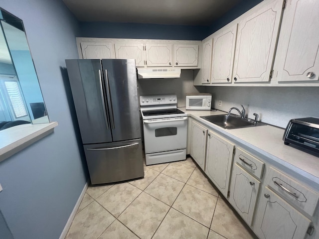 161 Dorset D, Boca Raton, FL 33434 - kitchen with white appliances, a sink, under cabinet range hood, light countertops, and white cabinetry