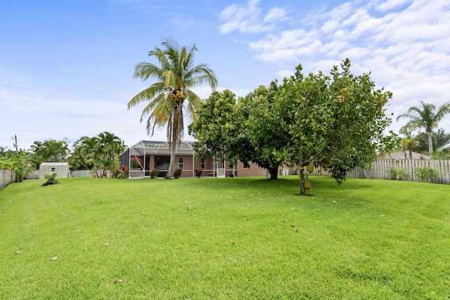 1992 SE Fairfield St, Port Saint Lucie, FL 34983 - view of yard featuring glass enclosure