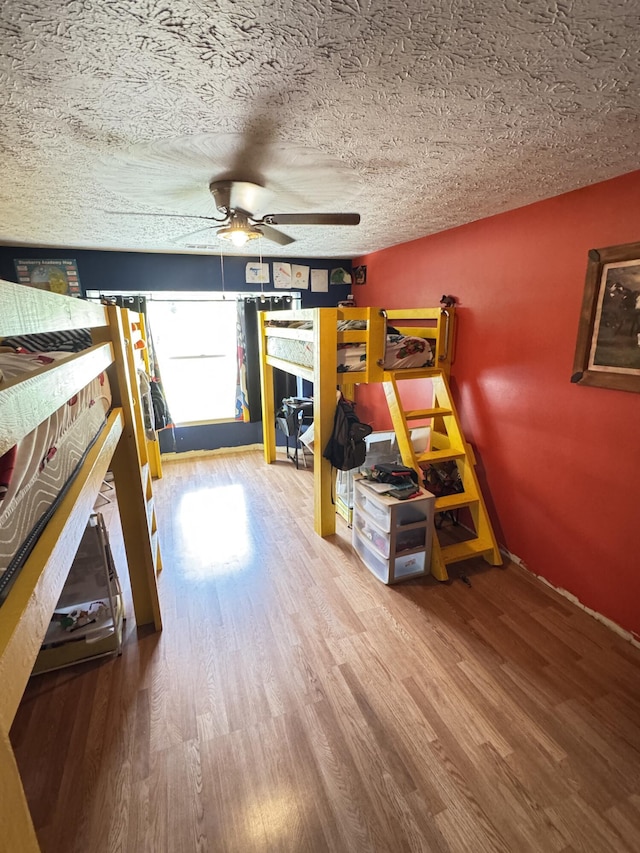7810 Santa Clara Blvd, Fort Pierce, FL 34951 - bedroom featuring wood finished floors and a textured ceiling