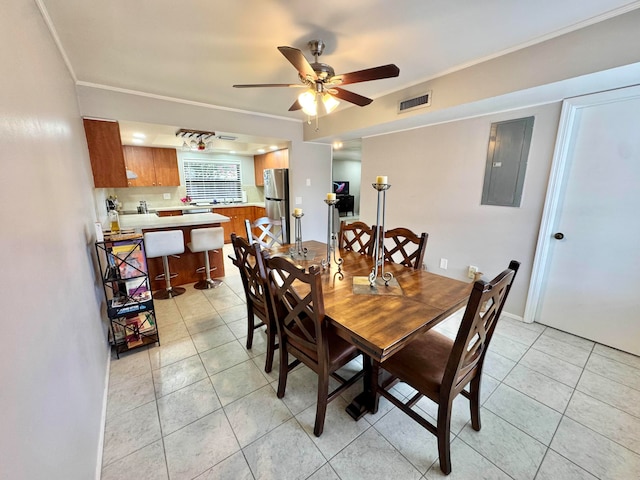 15015 SW 49th Ln Unit A-113, Miami, FL 33185 - dining room featuring light tile patterned floors, ceiling fan, electric panel, and crown molding