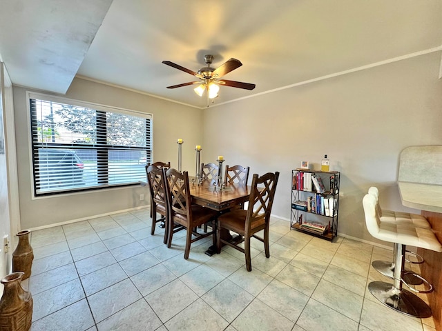15015 SW 49th Ln Unit A-113, Miami, FL 33185 - dining area featuring light tile patterned flooring, a ceiling fan, baseboards, and ornamental molding