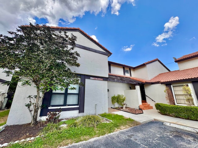 15015 SW 49th Ln Unit A-113, Miami, FL 33185 - view of front of property featuring a tile roof and stucco siding