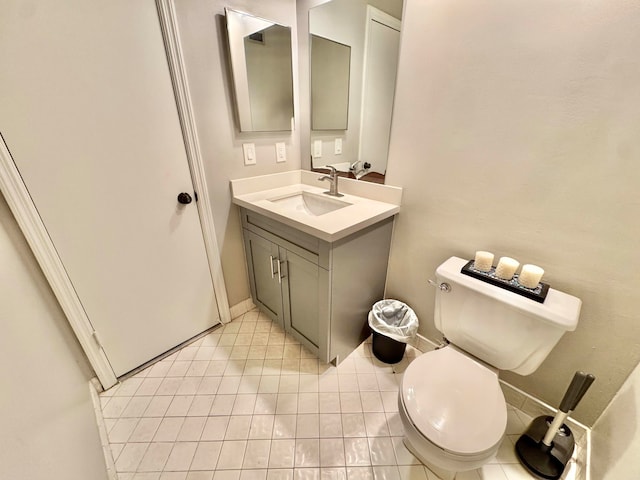 15015 SW 49th Ln Unit A-113, Miami, FL 33185 - bathroom featuring vanity, toilet, tile patterned floors, and baseboards