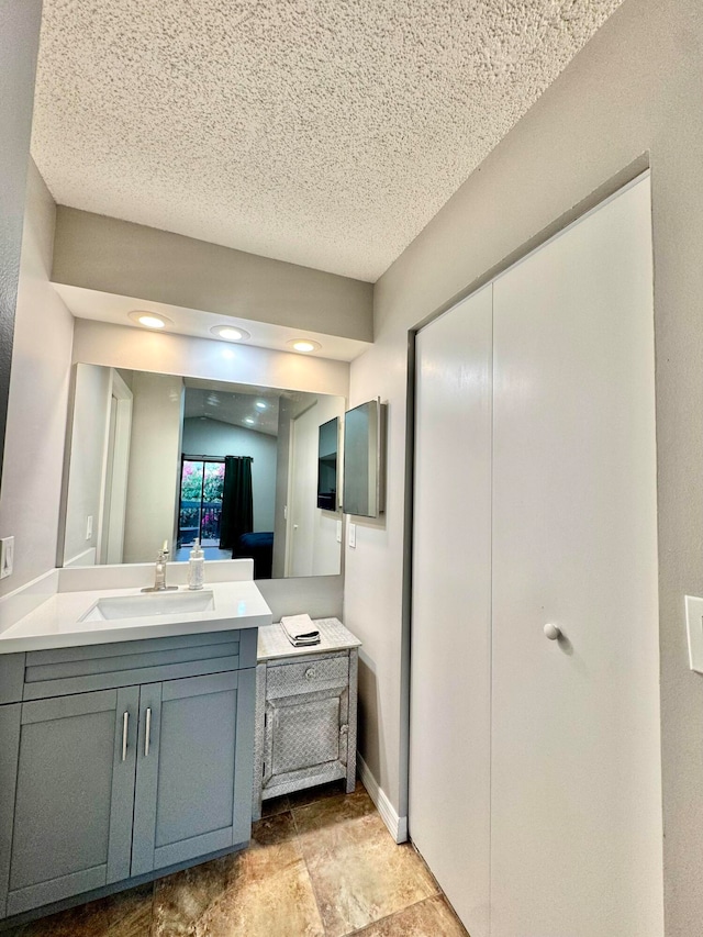 15015 SW 49th Ln Unit A-113, Miami, FL 33185 - bathroom featuring vanity and a textured ceiling