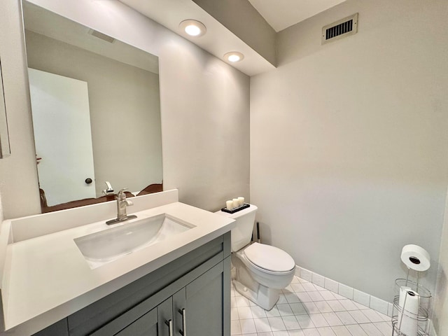 15015 SW 49th Ln Unit A-113, Miami, FL 33185 - bathroom with toilet, vanity, tile patterned floors, baseboards, and recessed lighting