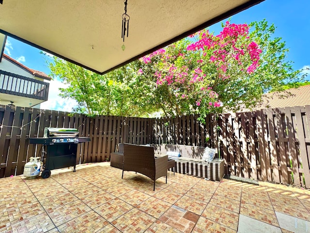 15015 SW 49th Ln Unit A-113, Miami, FL 33185 - fenced backyard featuring outdoor lounge area, a patio, and grilling area